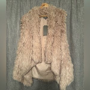 Fuzzy vest. Taupe. Medium. Pockets. Never worn.